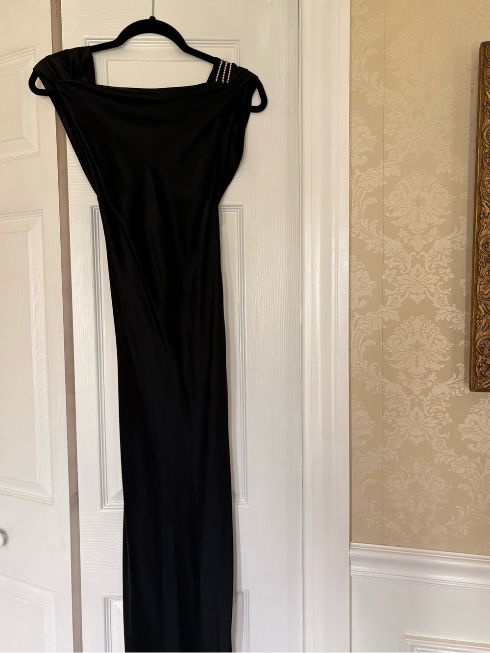 The Bar Black Backless Satin Gown with Rhinestone Strap.
